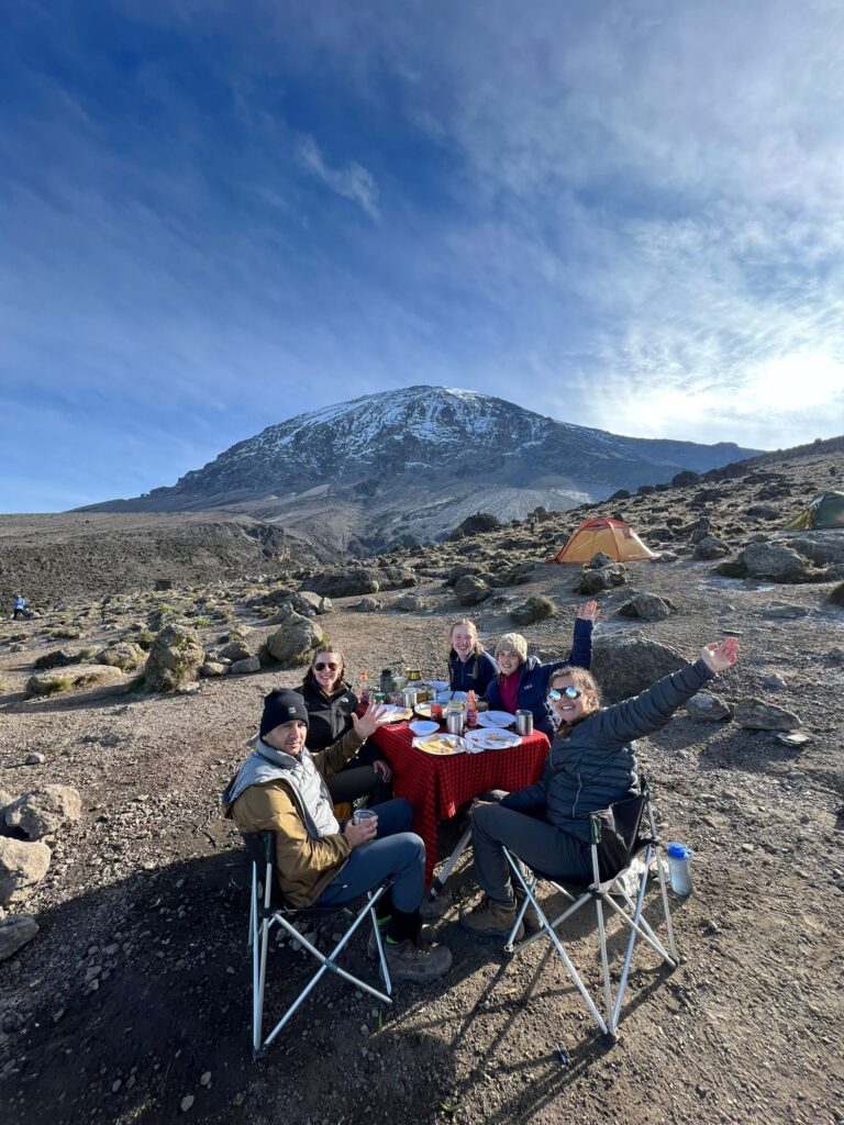 Alice, Diane, Amit, Rhiannon and Louise having lunch on Kilimanjaro