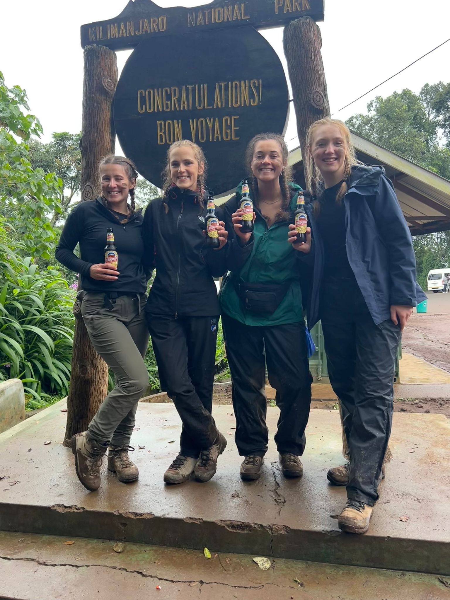 Alice, Diane, Amit, Rhiannon and Louise at Kilimanjaro's Mweka Gate