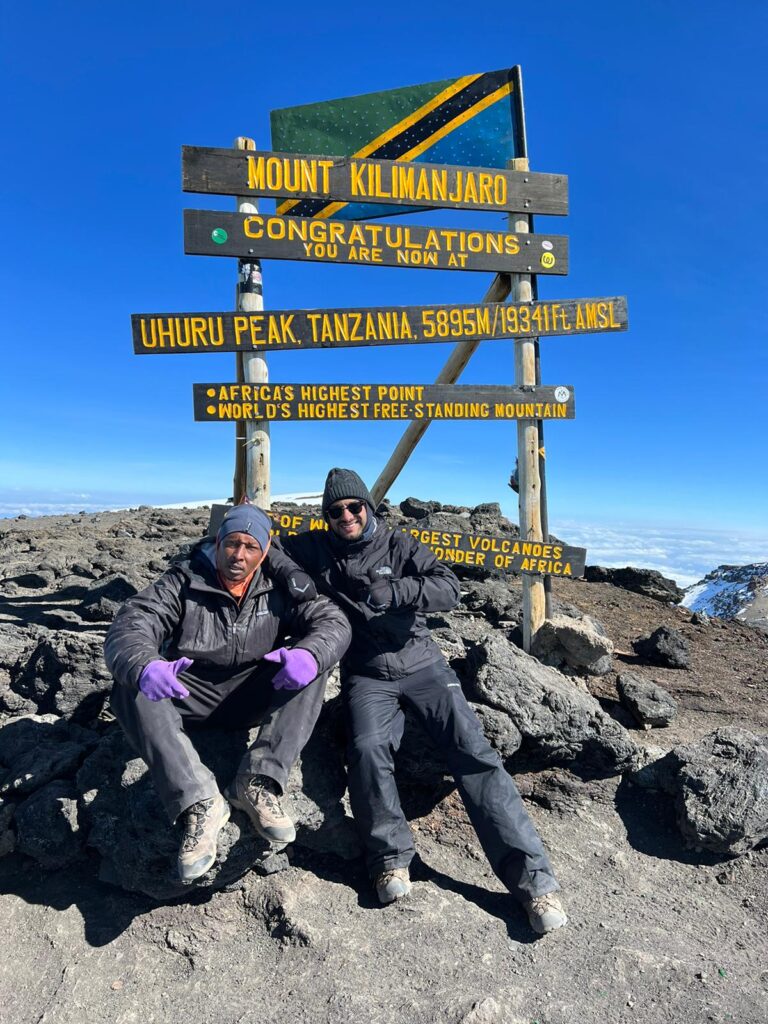 Kshitiz Gautam And Kilimanjaro Guide At Uhuru Peak